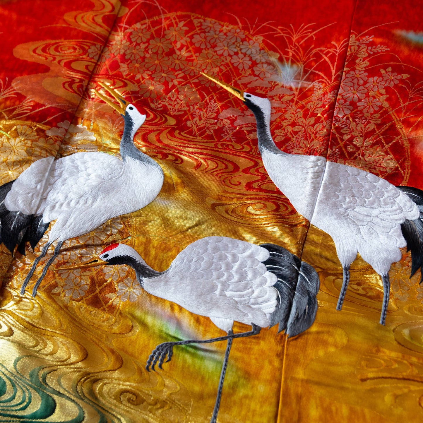 Japanese silk throw blanket showing three cranes in the river. Repurposed uchikake kimono.