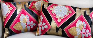 Readymade pillow set banner showing two black and pink silk obi pillows side by side on a couch.