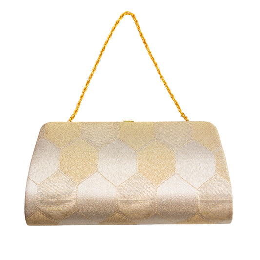Gold clutch bag with geometric pattern on a white background