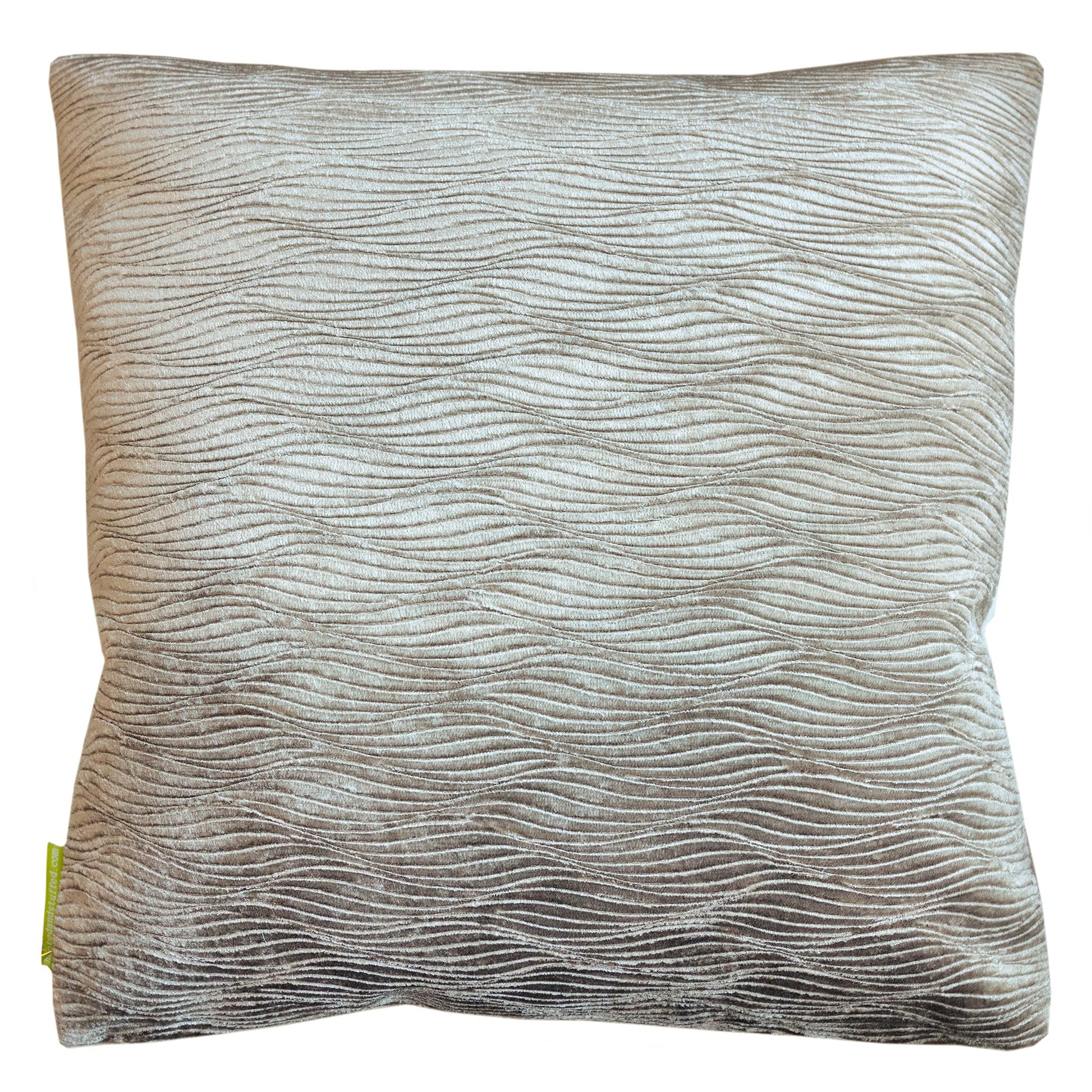 View of the reverse of the pillow showing beige designer velvet pillow back.