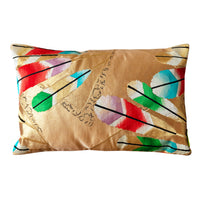 Metallic gold cushion with feathers