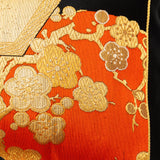 Orange silk with golden plum blossom embroidery from an obi pillow by hunted and stuffed