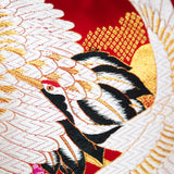 detail of cranes head and wing from vinatge obi pillow by hunted and stuffed