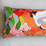 Detail of the remade vintage kimono pillow showing orange silk and green pine by Hunted and Stuffed