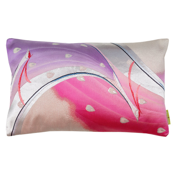 A pink and purple peacock design pillow made from shiiny silver vintage obi silk.