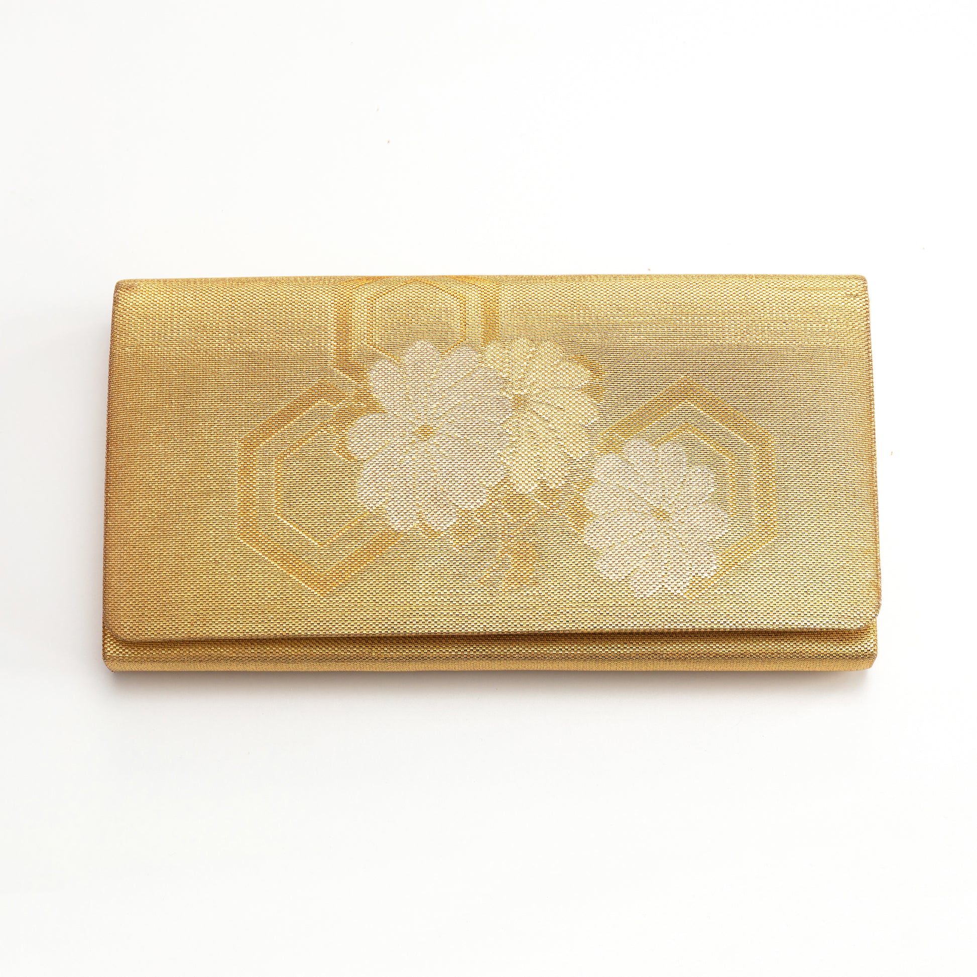 Gold clutch bag with floral design on a white background