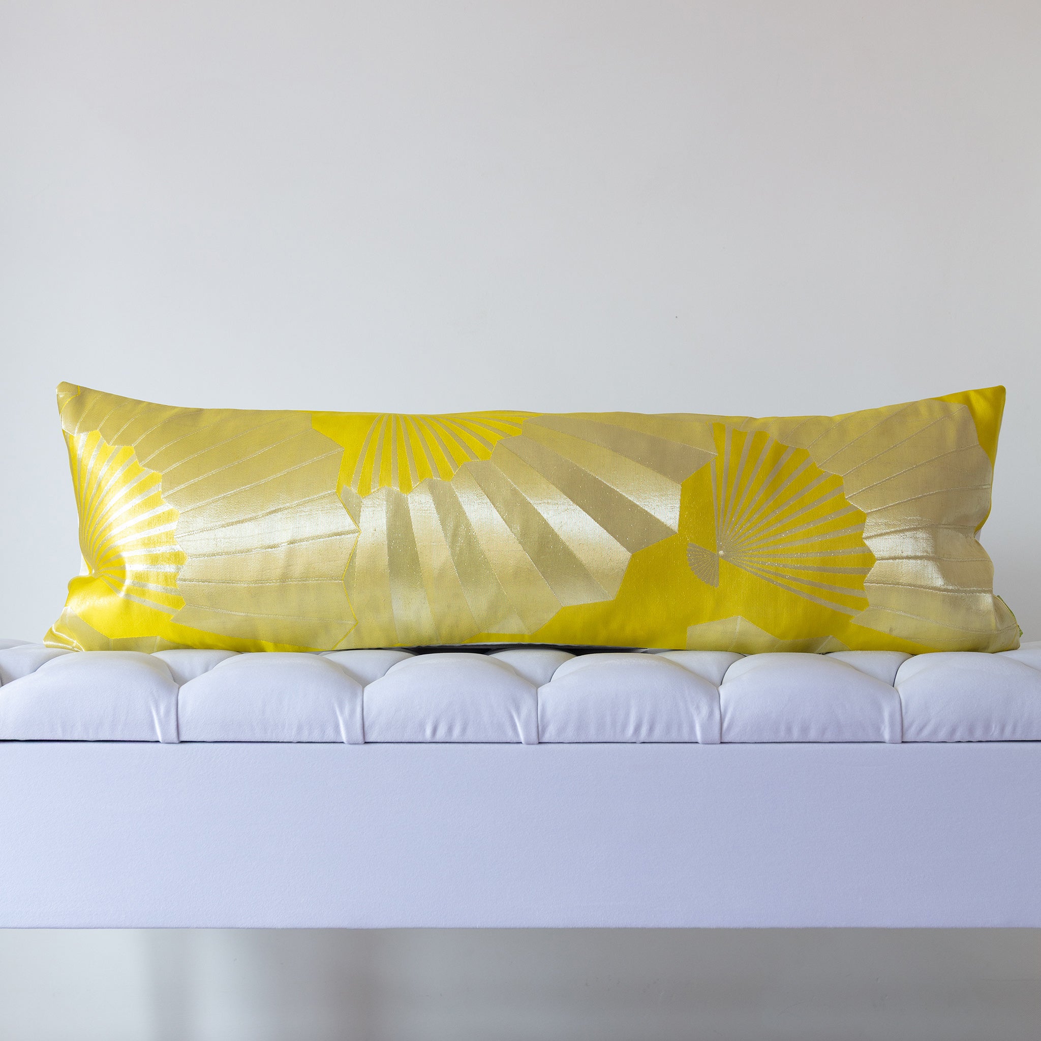 Chartreuse silk kimono bolster cushion with metallic Japanese fan pattern, crafted from vintage Japanese silk