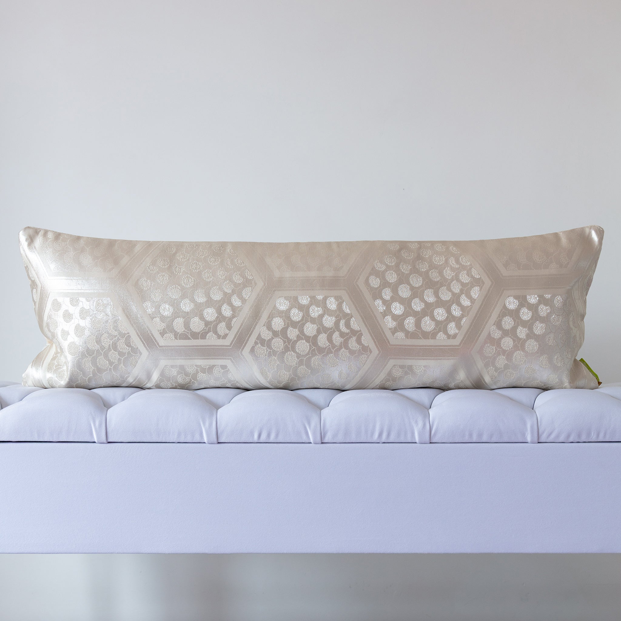 Cream and silver silk kimono bolster cushion with geometric hexagon pattern, crafted from vintage Japanese silk