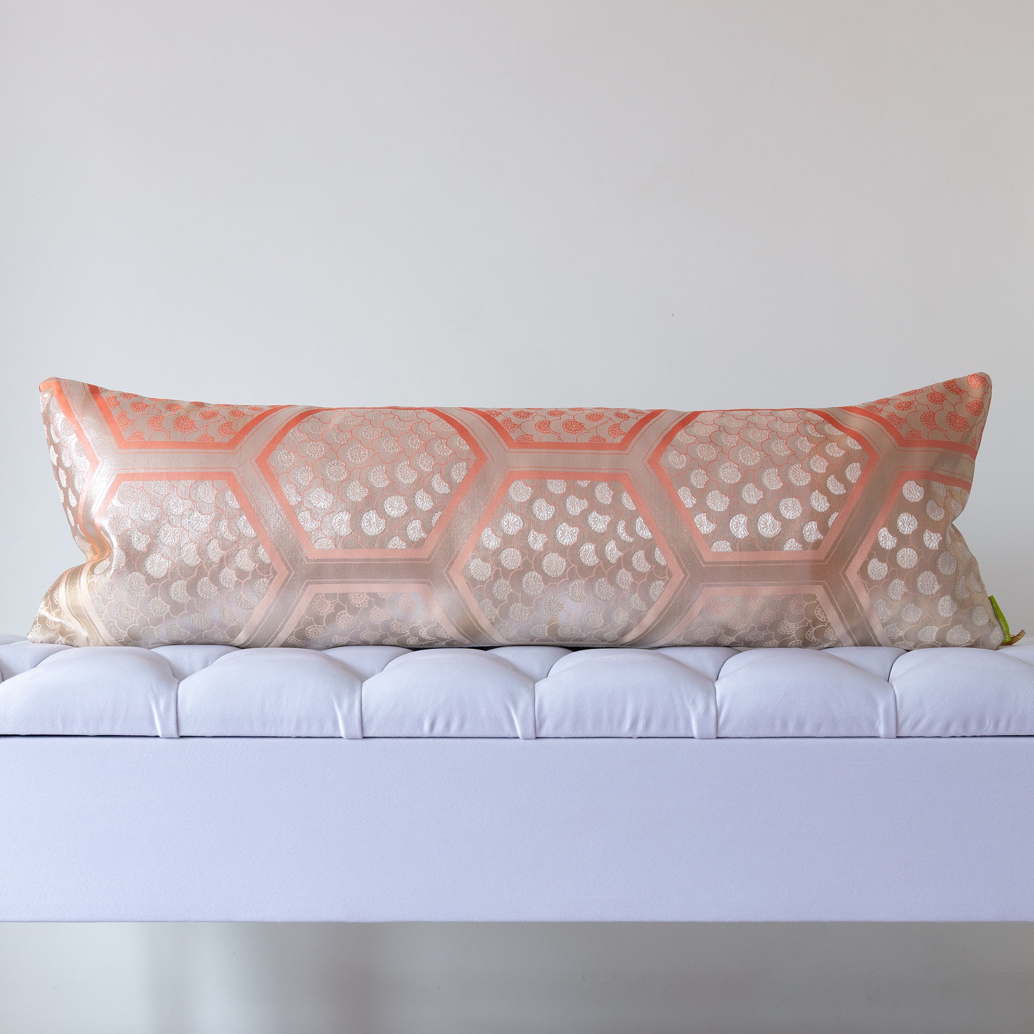 Peach and silver silk kimono bolster cushion with geometric hexagon pattern, crafted from vintage Japanese silk
