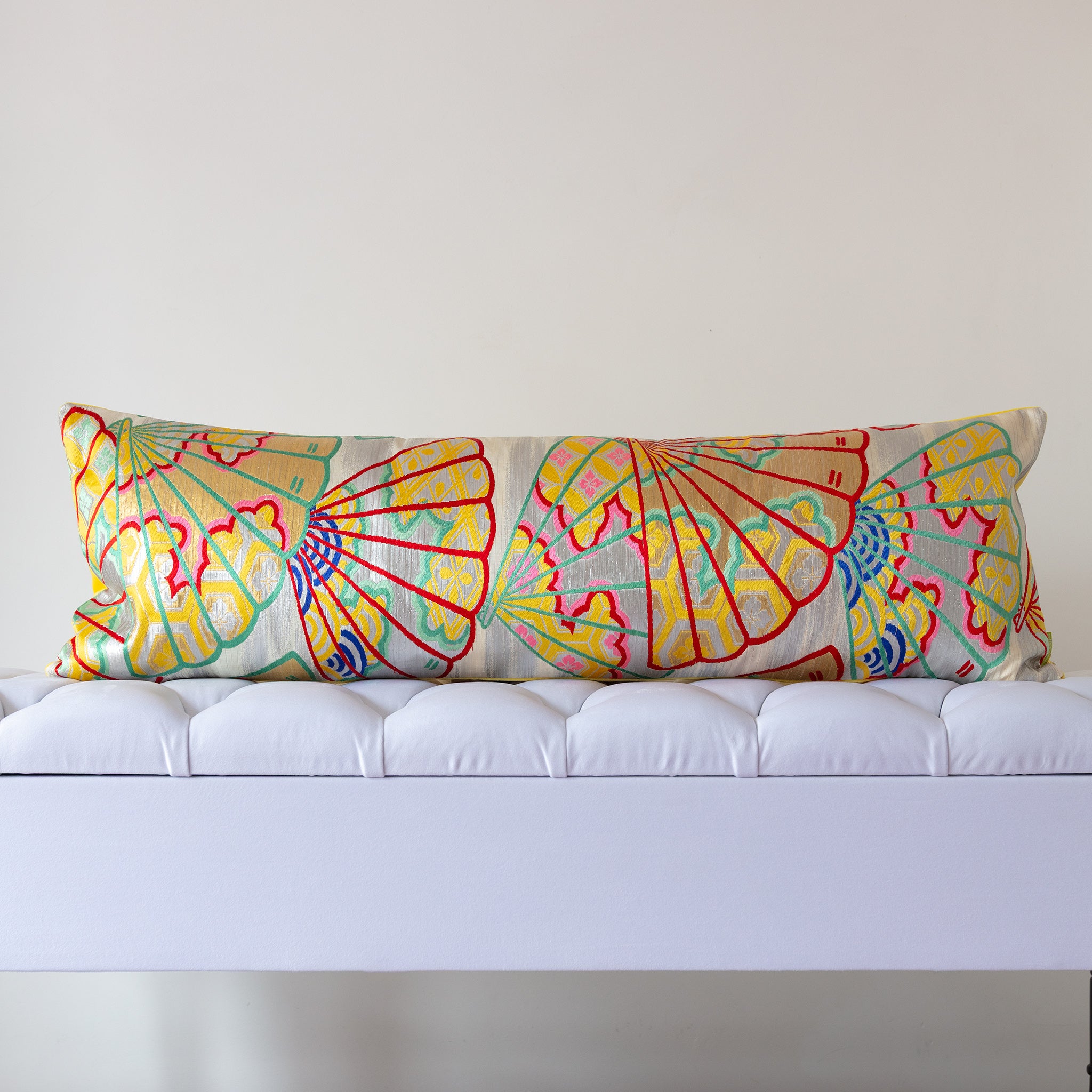 Silver and yellow silk kimono bolster cushion with traditional fan motif opening to the right, crafted from vintage Japanese silk