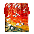 Close-up of multicolour silk fabric edge showcasing intricate vintage kimono-inspired embroidery detail.