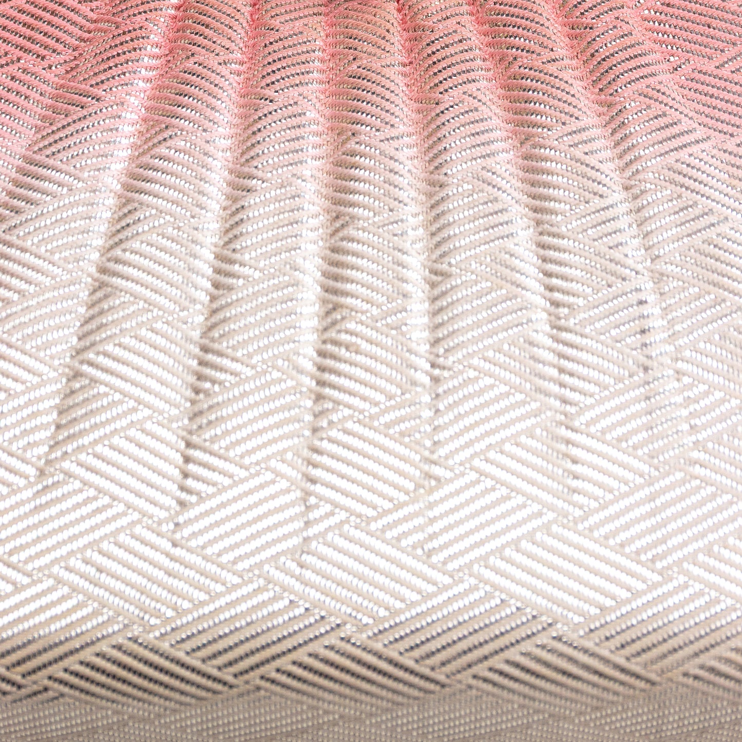 Close-up of a vintage Japanese kimono silk clutch bag in pink and white ombre, metallic silver basket weave pattern.