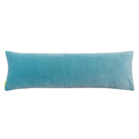 View of the back of the long bolster pillow made of blue velvet.