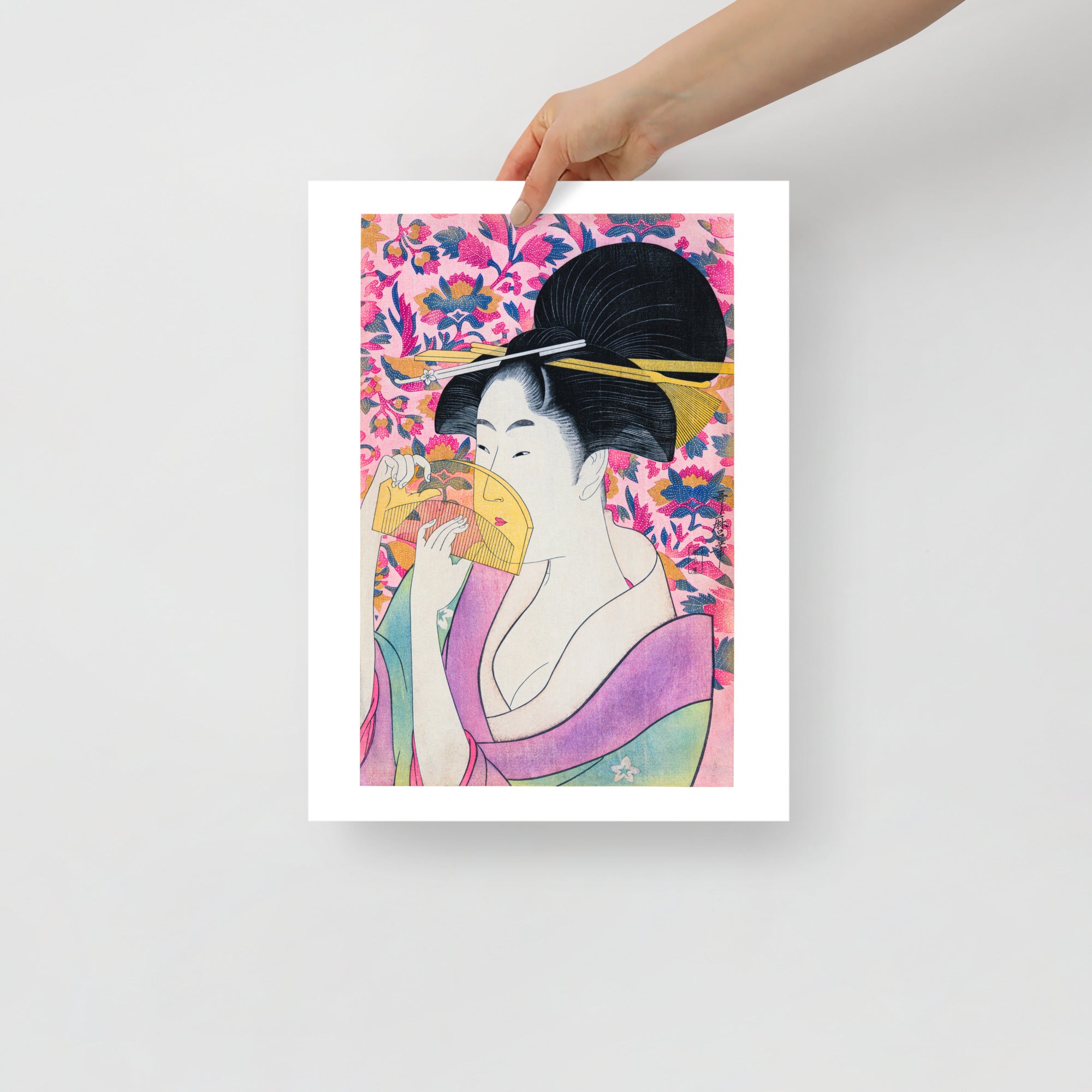 Close-up of Kitagawa Utamaro print’s textured paper and delicate ink lines from an overhead perspective highlighting fine