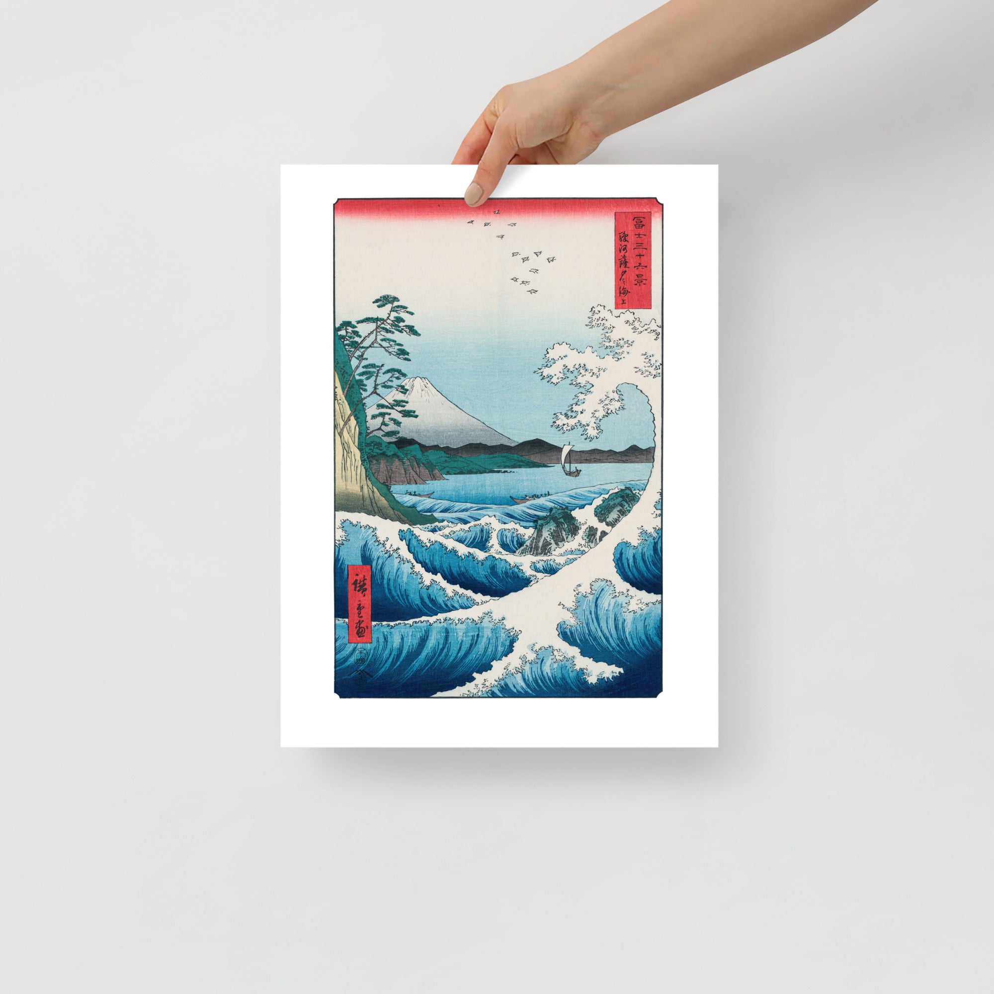 Close-up of textured ukiyo-e woodgrain and subtle ink gradation on the Hiroshige Sea at Satta print's shoreline detail