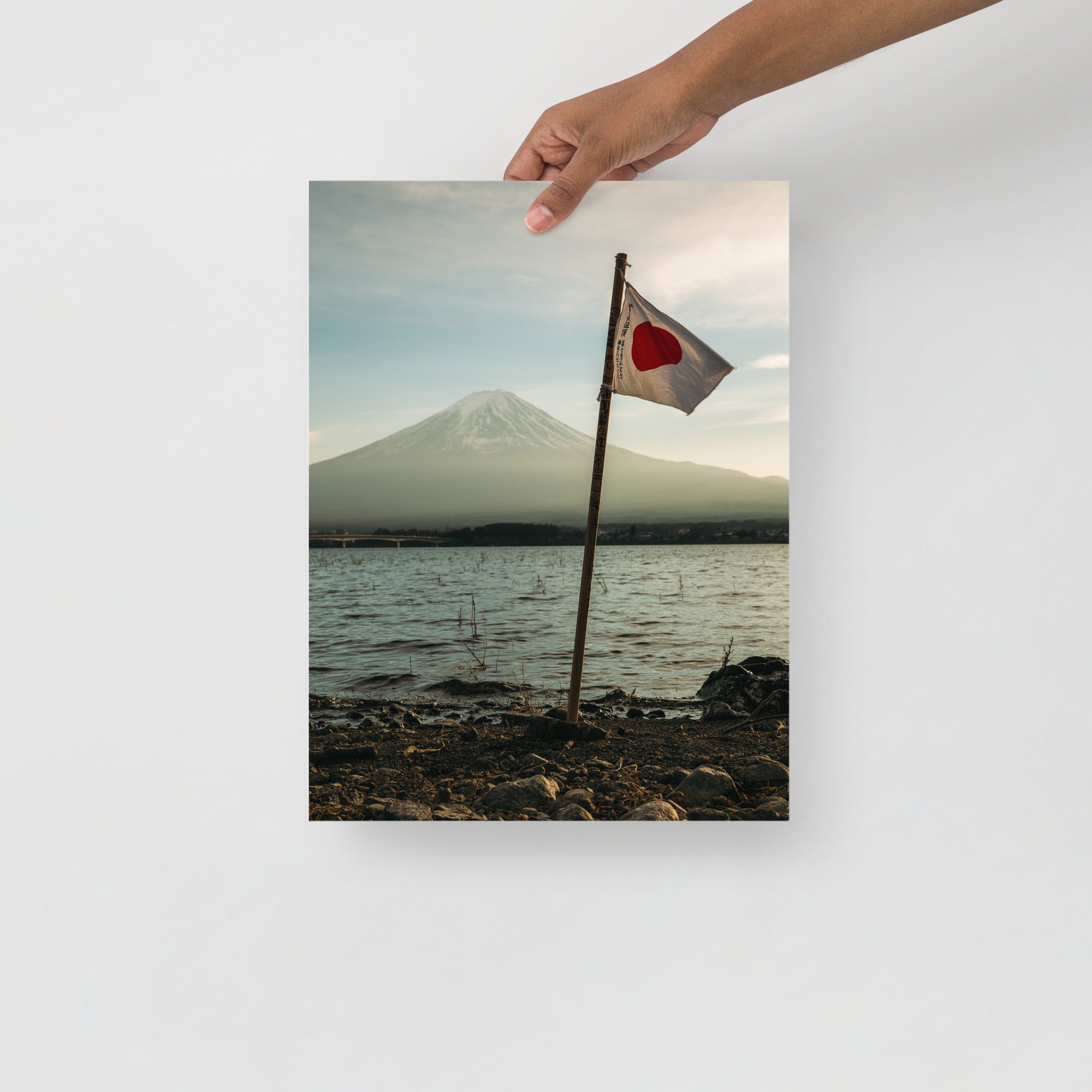 Close-up of Mount Fuji's textured ink wash and subtle brushstroke details from a top-down perspective on the vintage print.