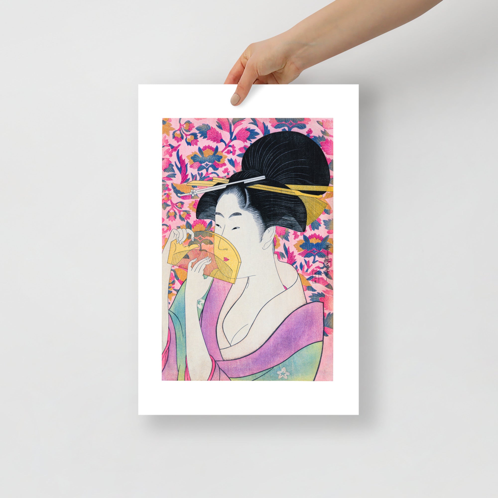 Close-up of Kitagawa Utamaro print showing intricate line work and subtle color gradations in the details of the portrait's