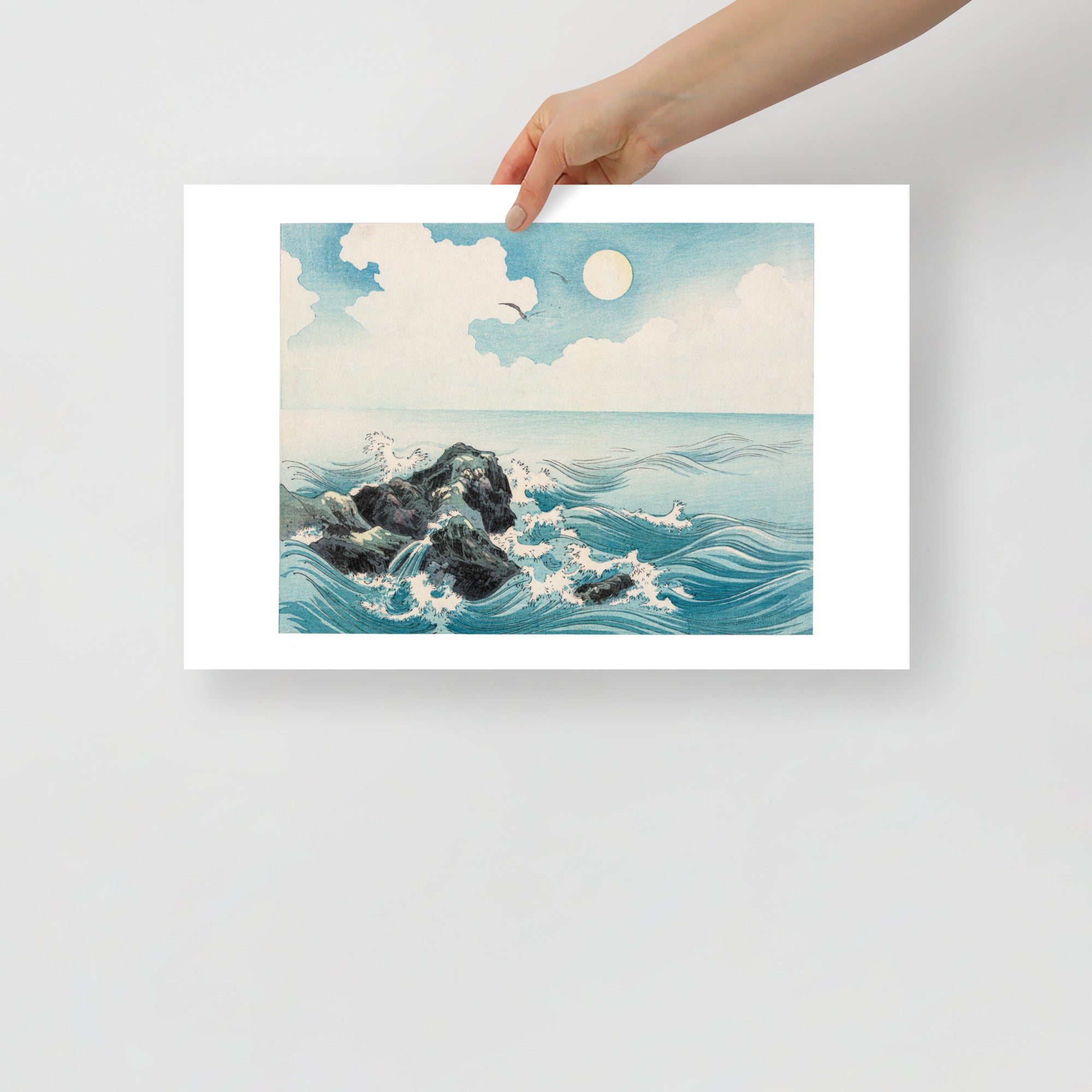 Detail shot of textured waves crashing on rugged rocks, highlighting intricate woodcut carving and dynamic motion in the