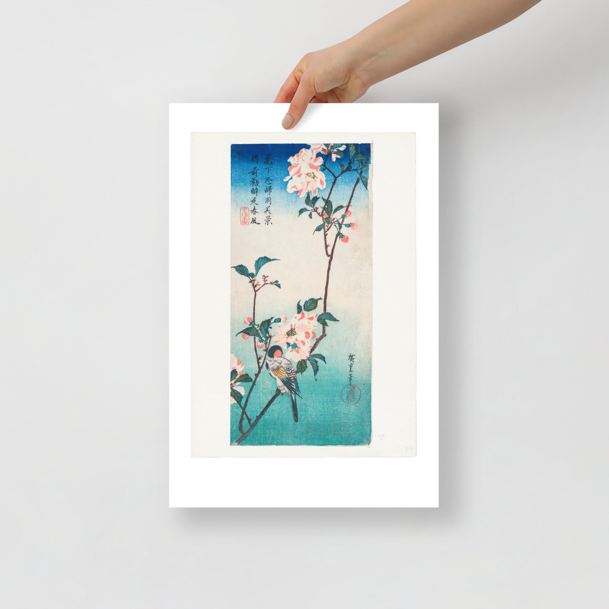 Close-up of Hiroshige's small bird perched among delicate cherry blossoms, highlighting intricate line work and vibrant