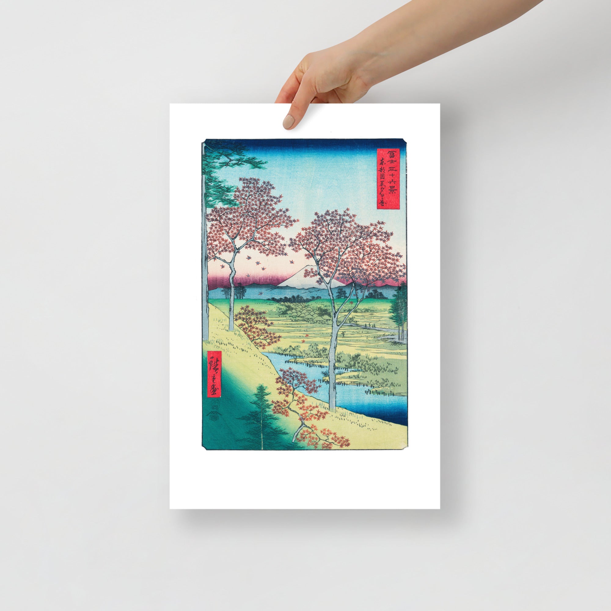 Close-up of vibrant sunset hues and intricate maple leaf details on the woodblock's upper right corner