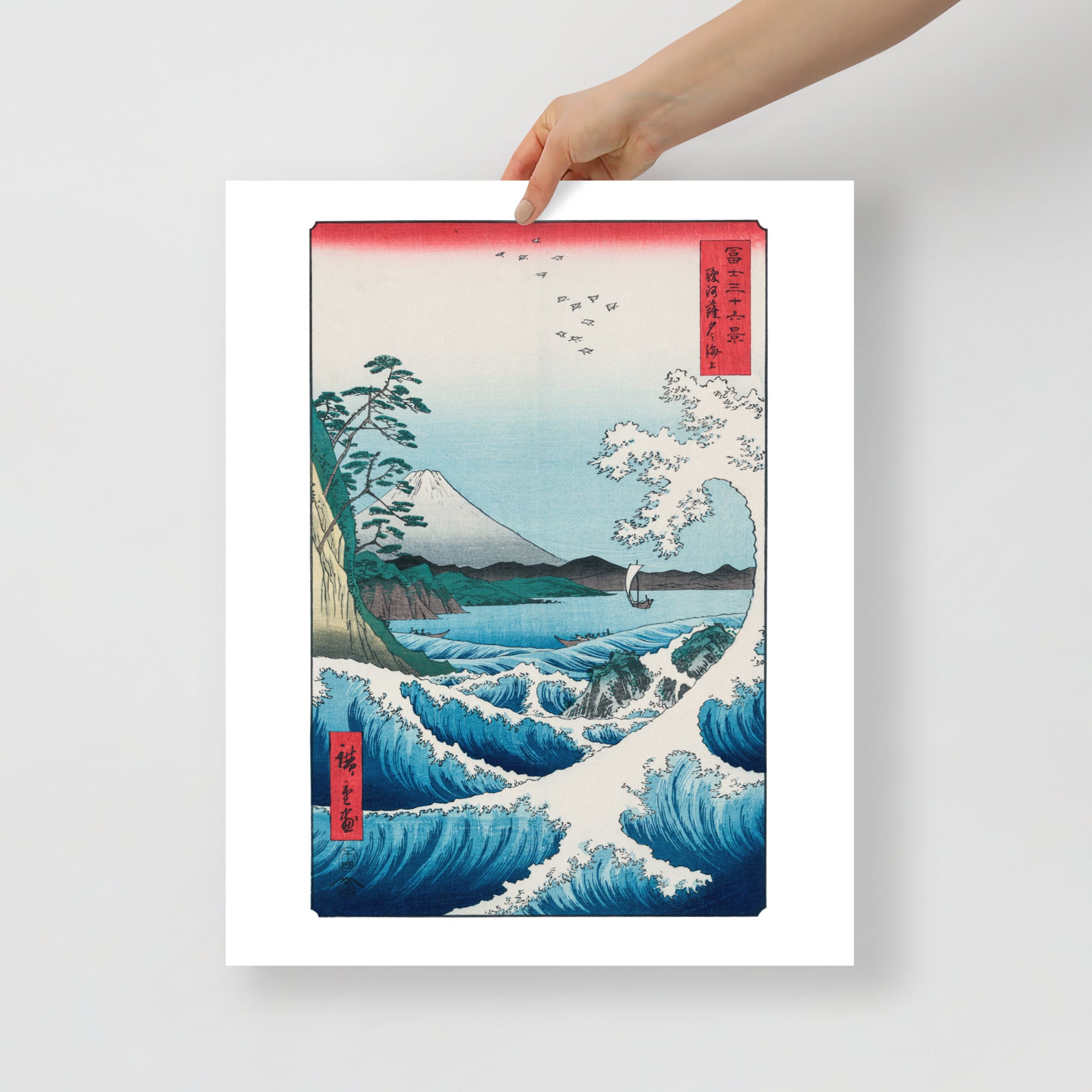 Close-up of the intricate wave patterns and textured indigo background highlighting Hiroshige's precise brushwork and color