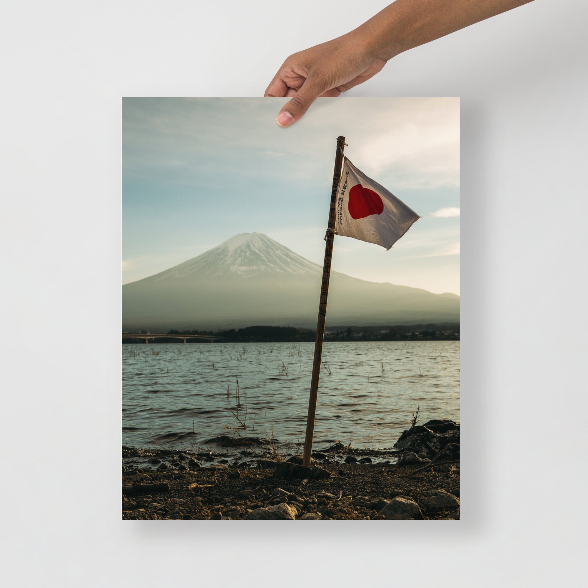 Close-up of the vintage Mount Fuji print's textured paper surface highlighting brushstroke details and signature artist mark