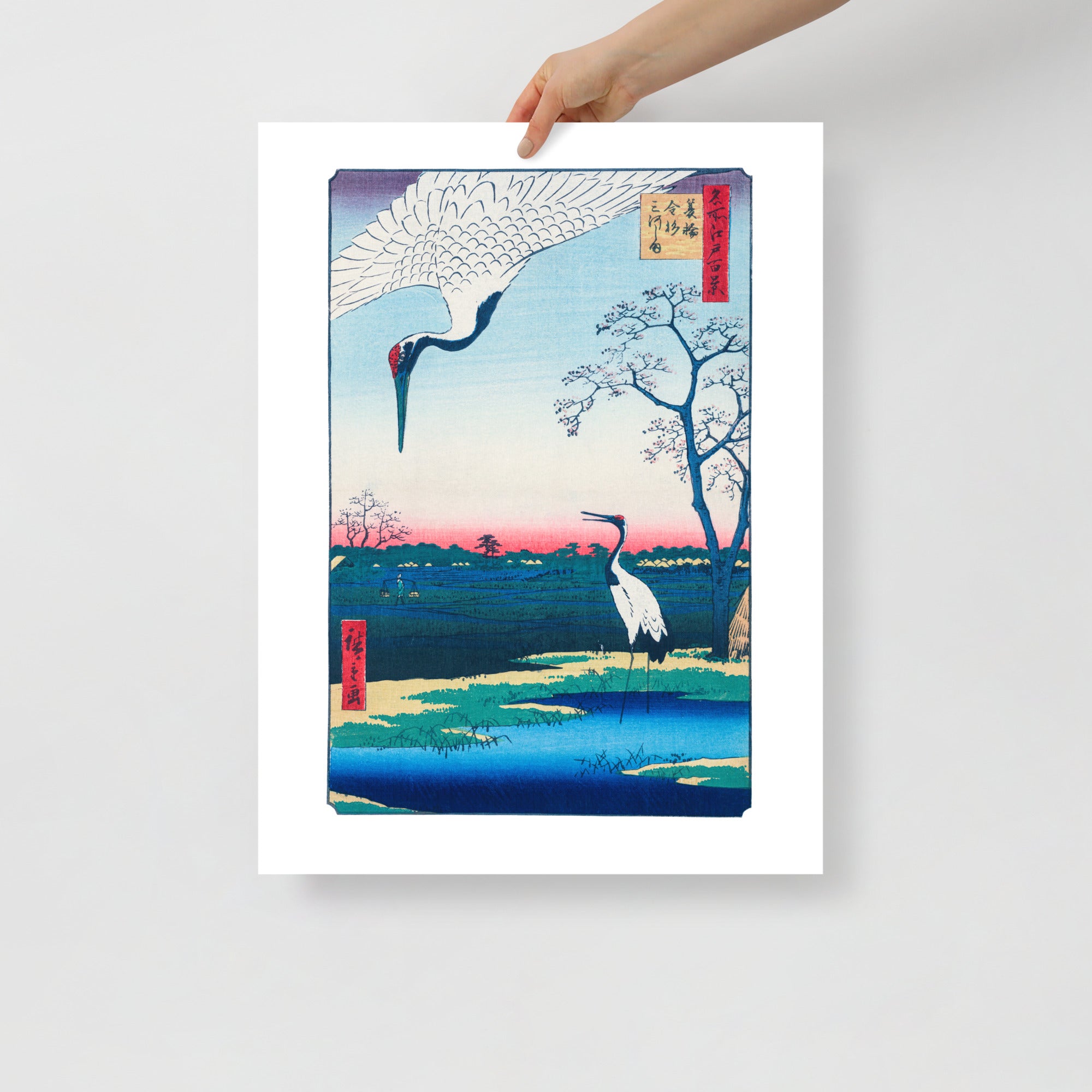 Close-up of crane feathers displaying intricate woodblock texture and fine ink lines, highlighting artist’s delicate