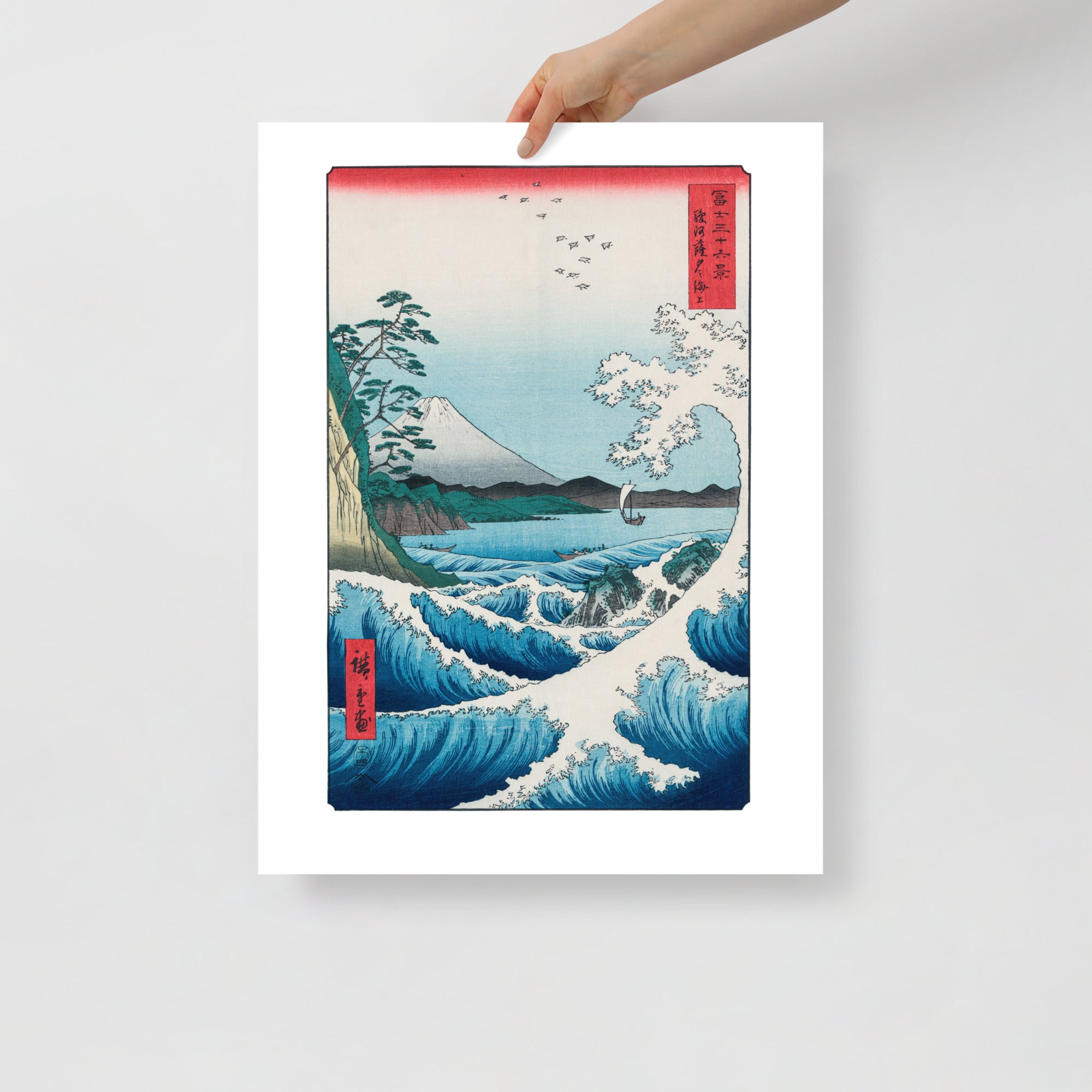 Detail of Hiroshige Sea at Satta woodblock print showing intricate wave textures and rich indigo hues from a lower-angle