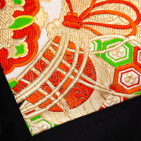 Detail of obi silk drum pattern.