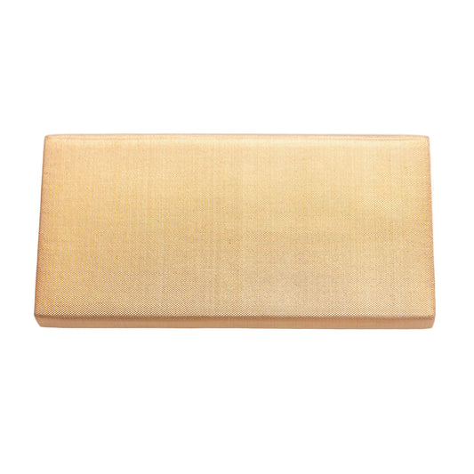Gold clutch bag on a white background, view of the back of the clutch bag.
