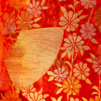Close-up of intricate gold silk embroidery highlighting red crane motifs on the vintage wedding kimono bolster cushion’s