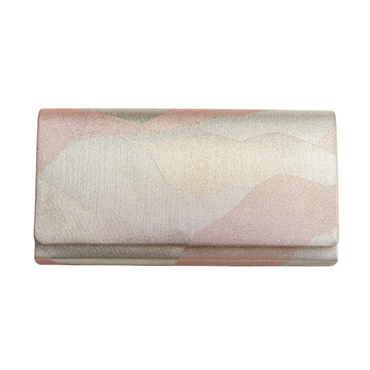 Abstract-patterned metallic silver and pink clutch bag on a white background