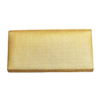 Close-up of the textured metallic gold fabric with intricate orange diamond embroidery highlighting the vintage kimono silk