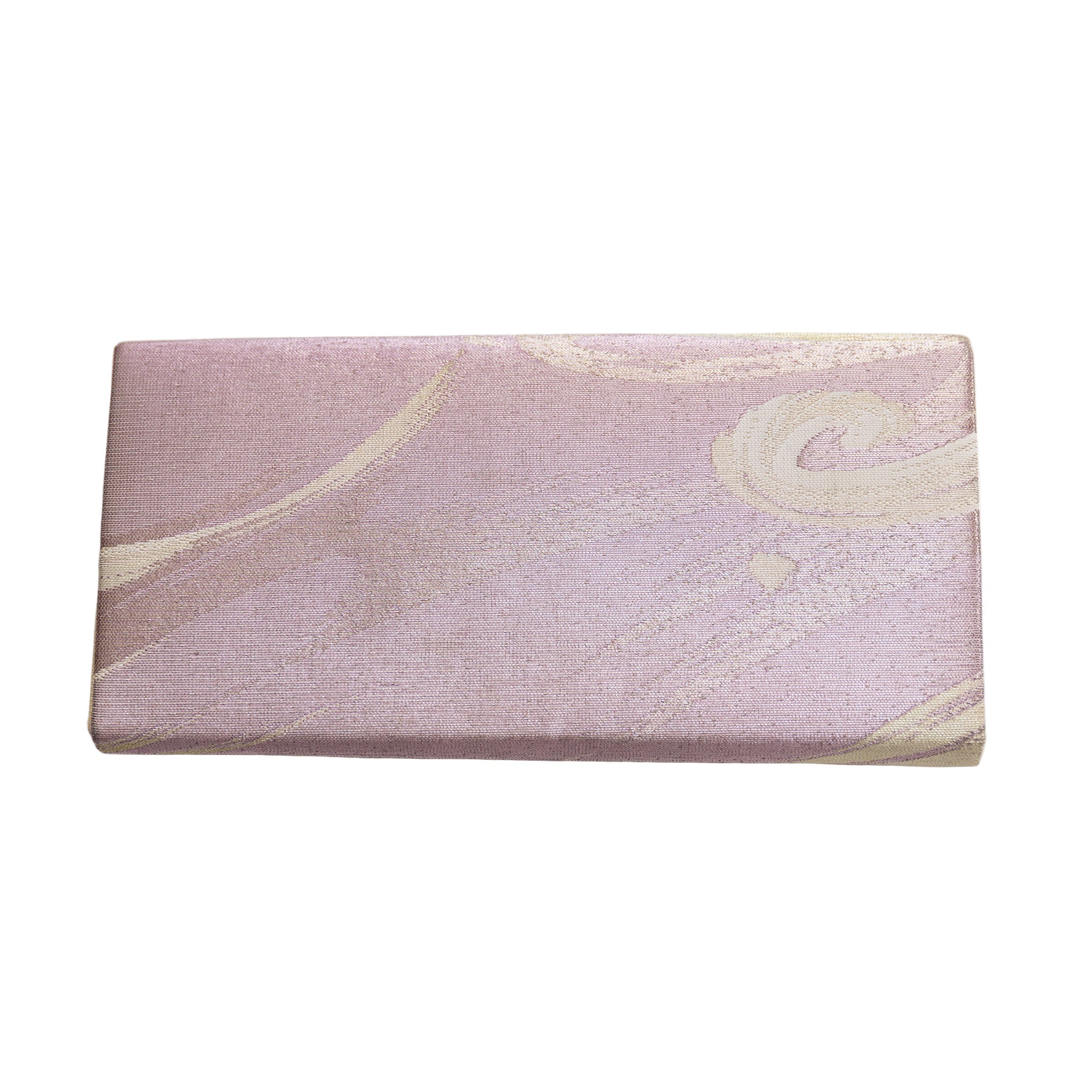 Close-up of lilac silk clutch’s delicate wave embroidery and subtle sheen, highlighting intricate craftsmanship and textured