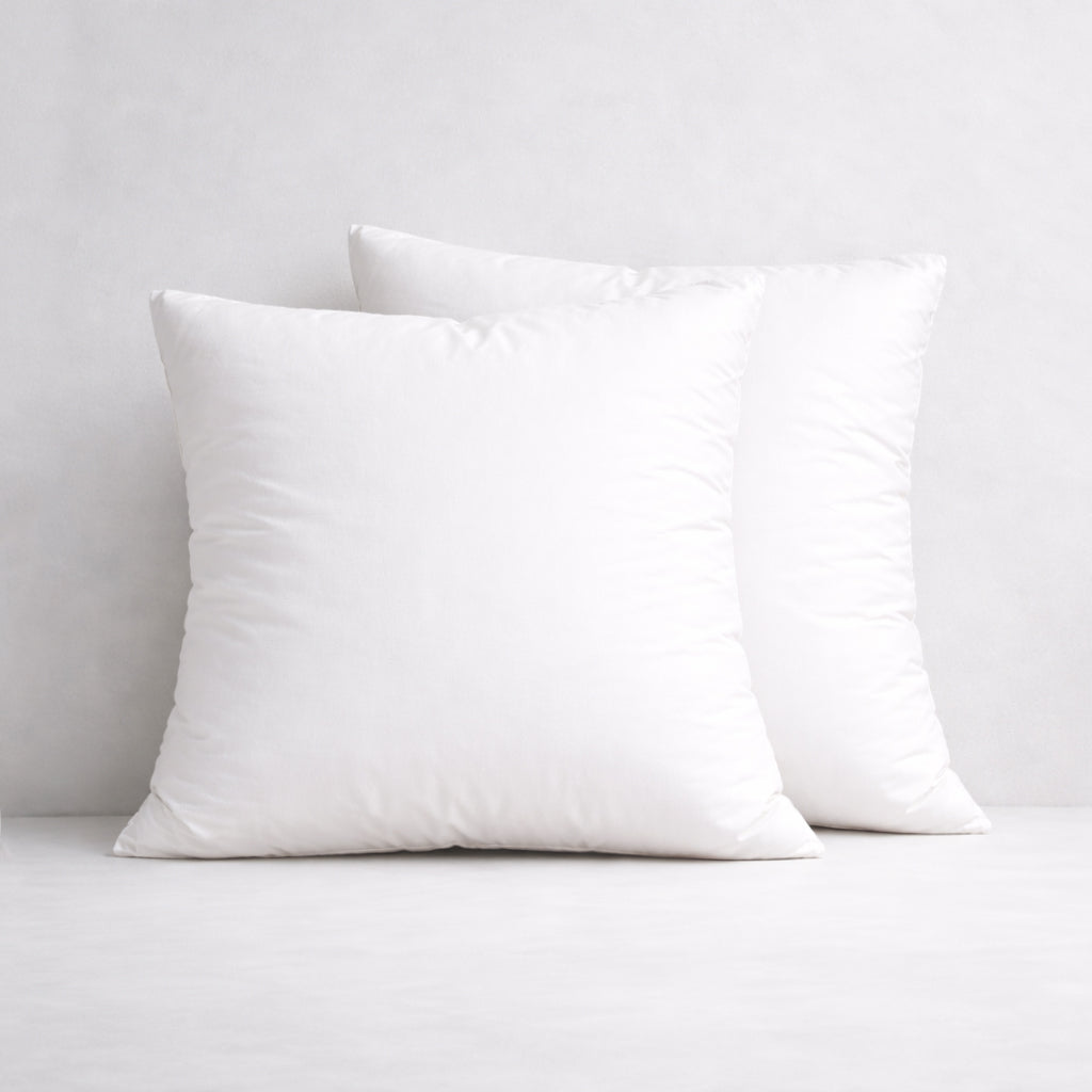 Set of two square feather cushion inserts with cotton cambric covers