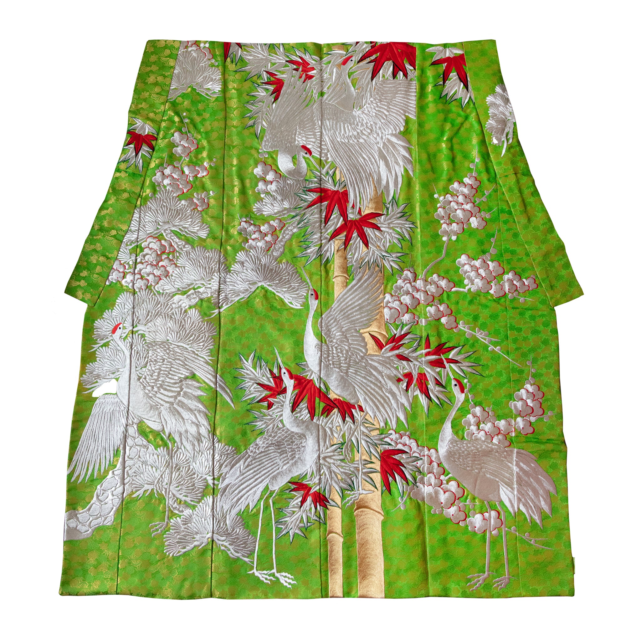 Close-up of intricate silk weave and vintage floral embroidery highlighting luxurious texture and subtle color variations.