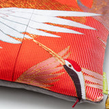 Small red accent pillow made with kimono silk, crane birds design, detail of concealed zip.