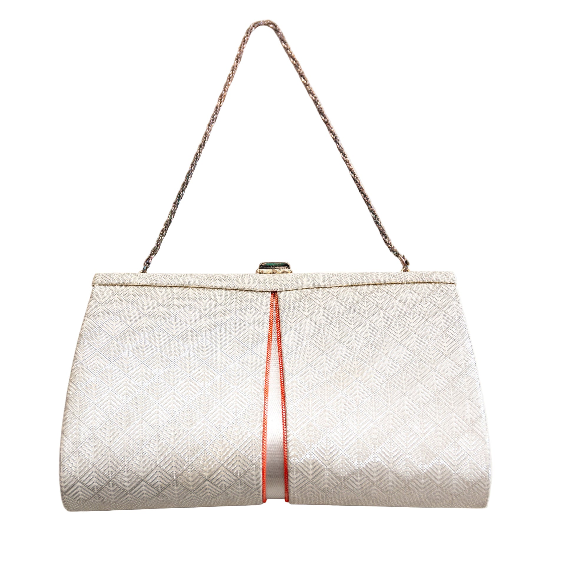 White textured handbag with a silver fancy chain strap and orange accents on a white background