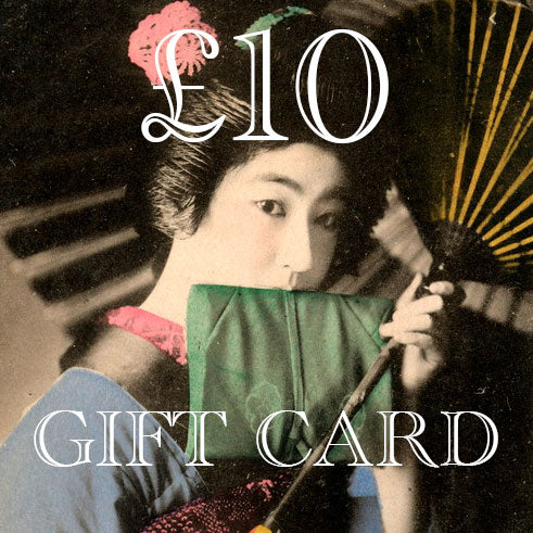 Hunted and Stuffed gift card with embossed logo, rectangular shape, textured paper, black and white design, 4x6 inches