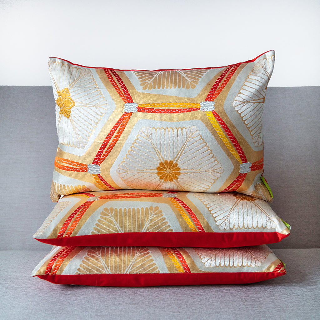 Close-up of the gold metallic sheen and intricate silk weave showcasing the vintage Japanese obi fabric's detailed texture