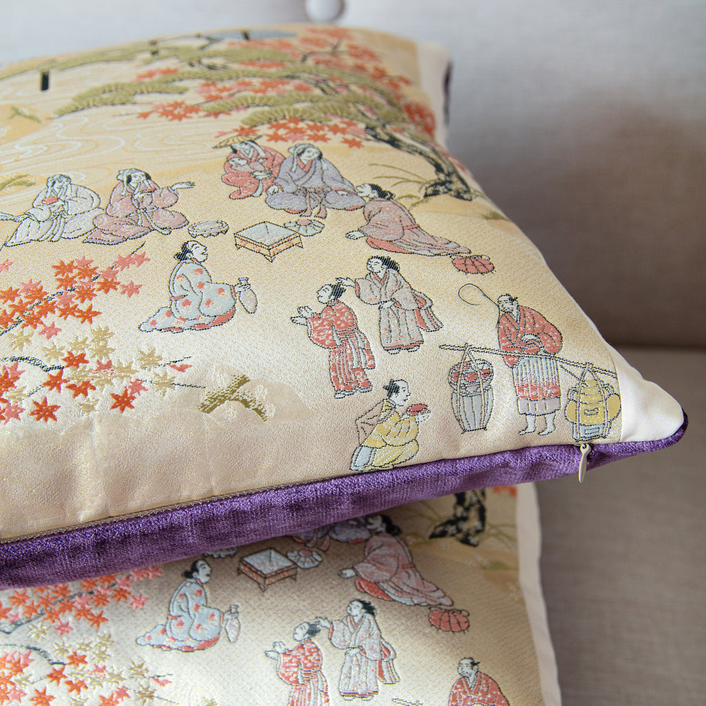 Close-up of the Antique Obi Cushion’s rich purple velvet fabric highlighting intricate stitching detail and subtle sheen.