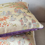 Close-up of the Antique Obi Cushion’s rich purple velvet fabric highlighting intricate stitching detail and subtle sheen.