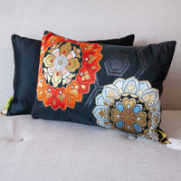 Japanese silk obi pillow in black with red flower design and black silk back.