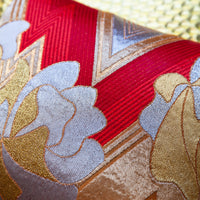 Oriental pillow in red and silver