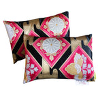 Pink Obi Pillow Set by Hunted and Stuffed featuring black silk fabric with gold accents, set of 2 cushions with textured