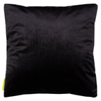 Close-up of red gold pine tree embroidered design on black velvet surface, highlighting textured stitching and intricate