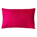 Close-up of pink silk obi cushion’s textured fabric with subtle sheen and delicate embroidered accents in a set of three