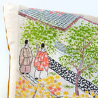 Close-up of vintage Nishijin silk fabric showcasing intricate embroidered details and rich texture on the 14-inch Obi Pillow.