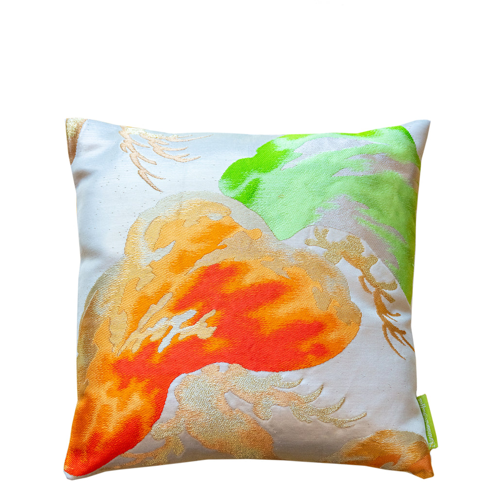 Hunted and Stuffed Cream Silk Throw Pillow, 12-inch square with orange and green Matsu Pines pattern, soft silky texture