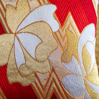 Detail of gold floral pillow with red silk back by Hunted and Stuffed